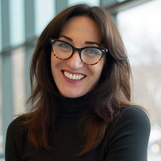 Photograph of communications, marketing, and branding strategist Brenna Hamilton.