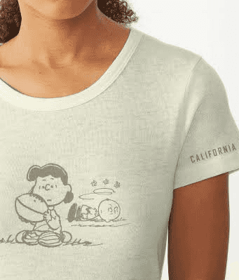 Image of Pigskin Peanuts women's branded t-shirt from a traveling exhibit brand system by Brenna Hamilton.