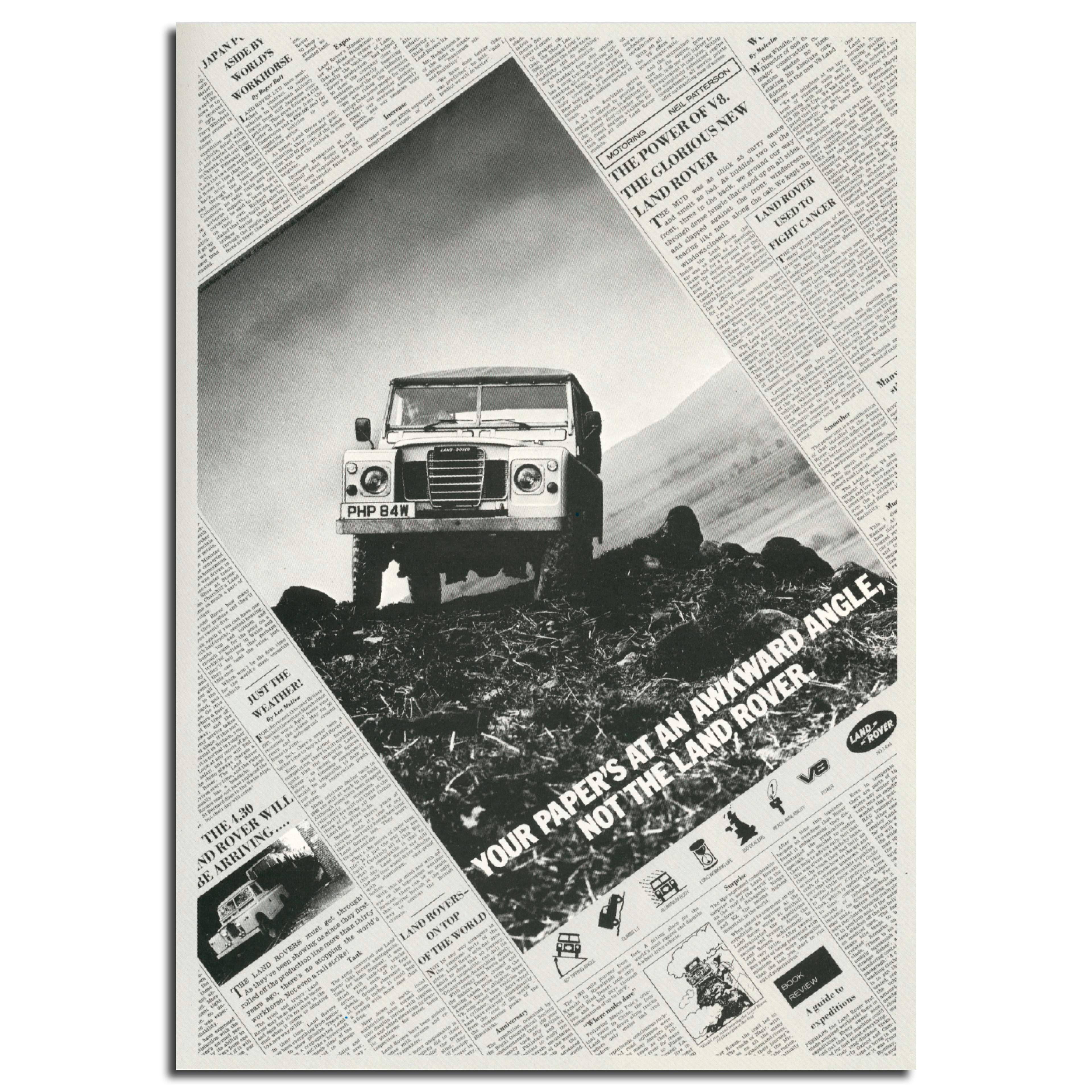 Black and white photo of a Land Rover at an angle in a newspaper. Award-winning press ad and copywriting for Land Rover.
