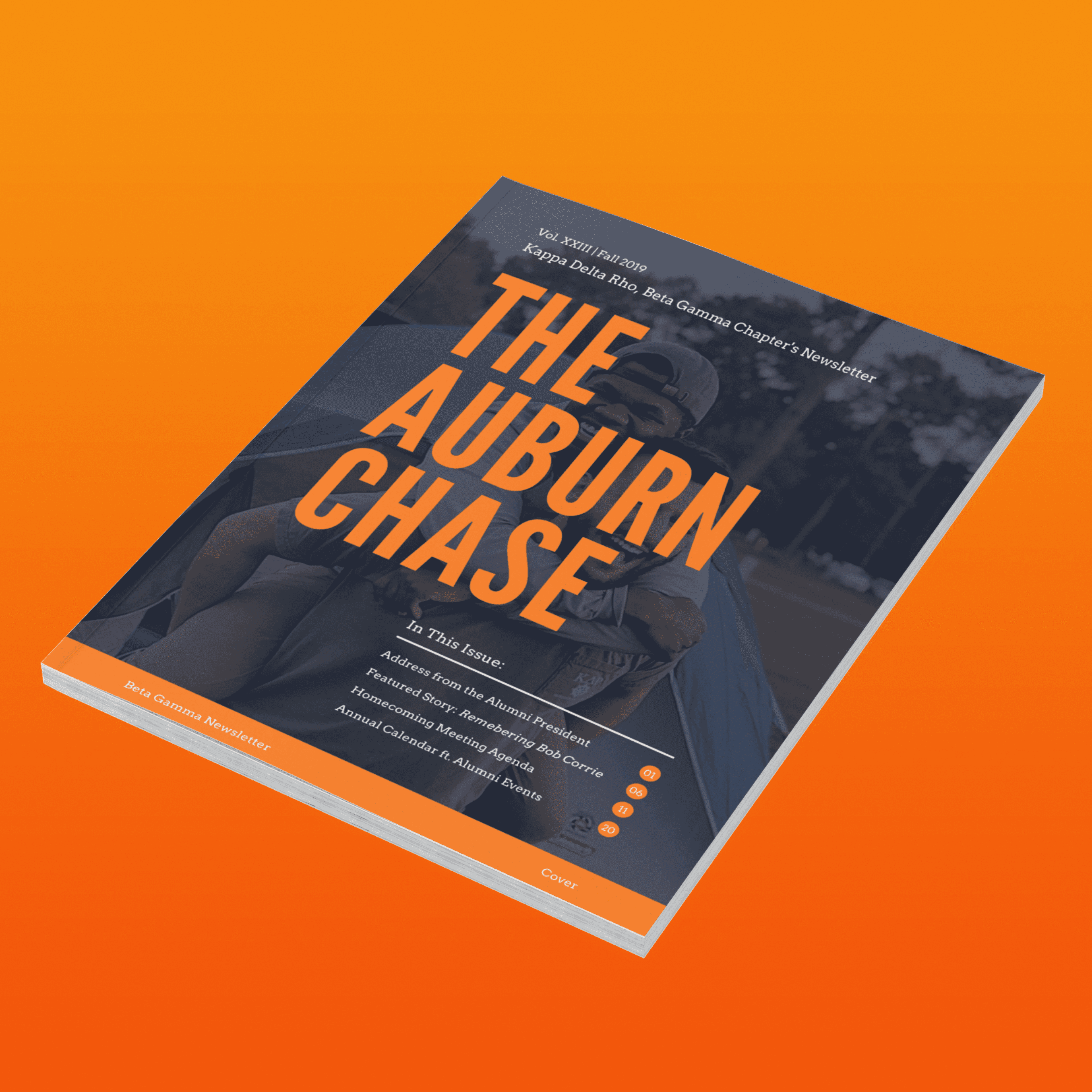 A magazine mockup with a large title reading "The Auburn Chase". The cover features two young men smiling at a campsite while on piggy back.