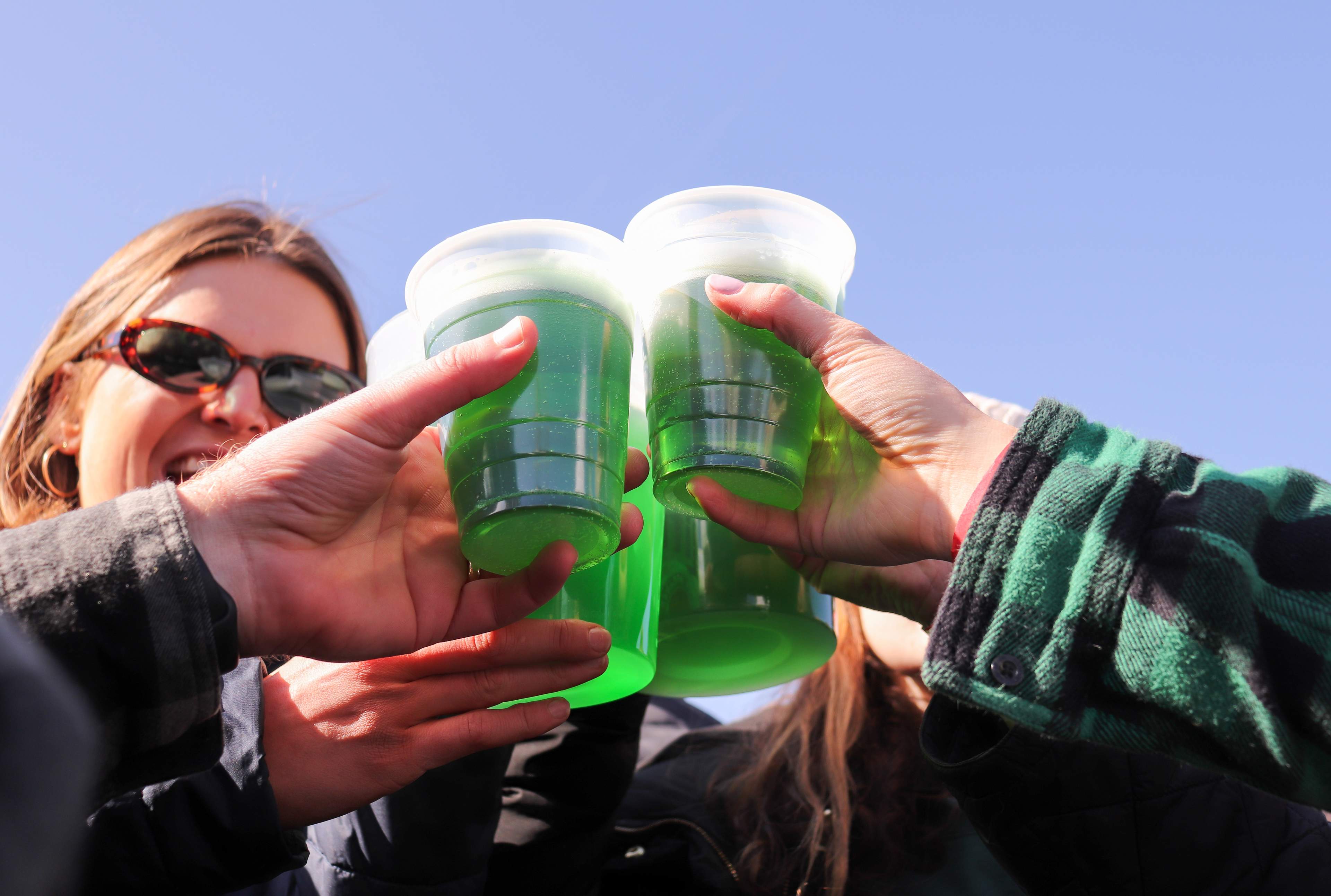 Cups with green beer