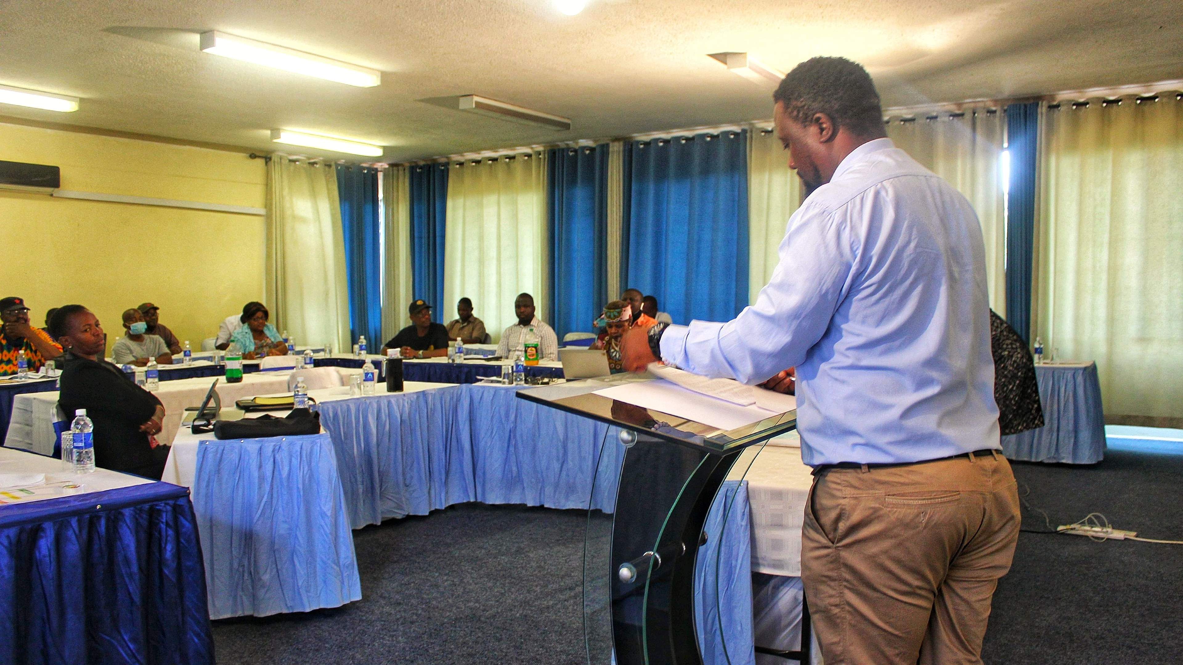 Thabang Farai Manhika presenting at a media training workshop for the Zimbabwe Electoral Commission.