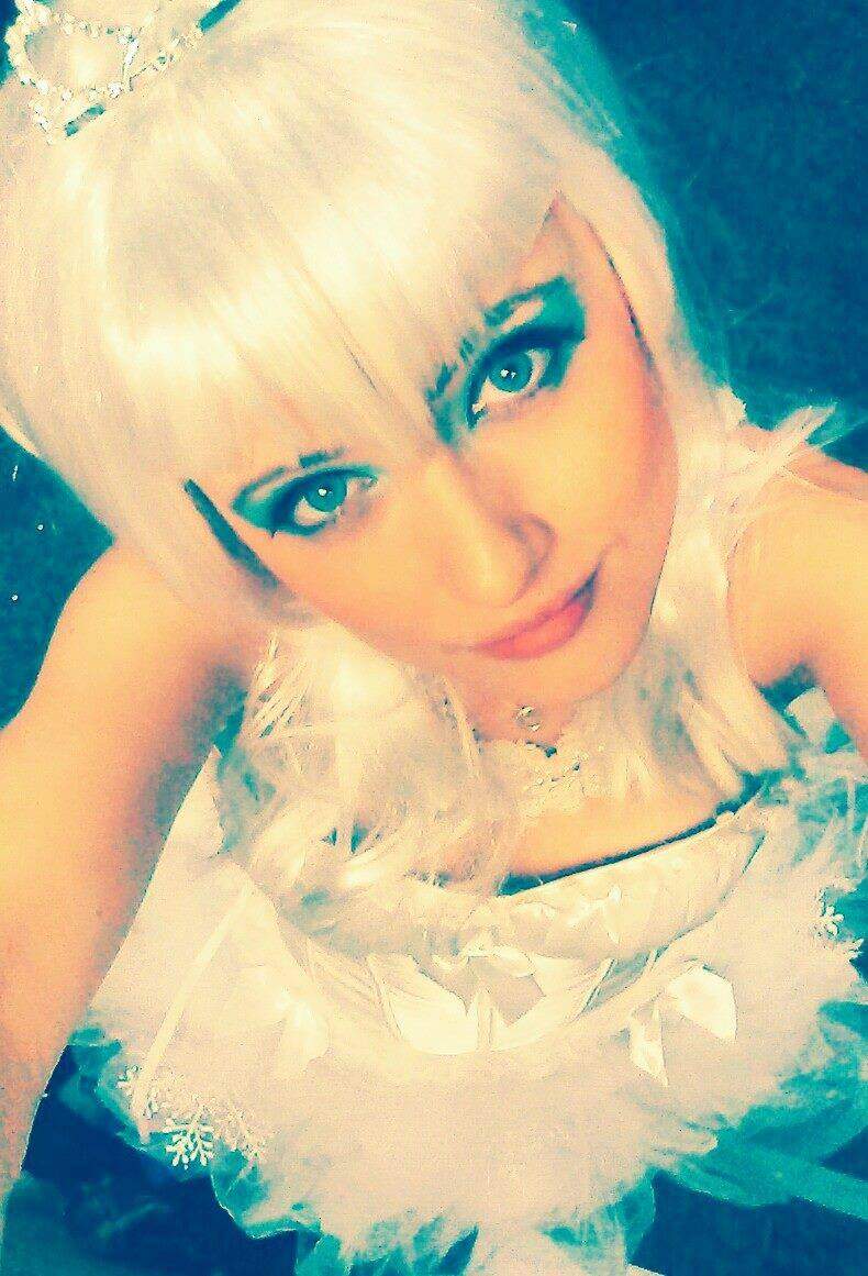 Ok, this one is a wig. It's a photo of me dressed as the Snow Queen for a Christmas gig, with very white-blonde hair.