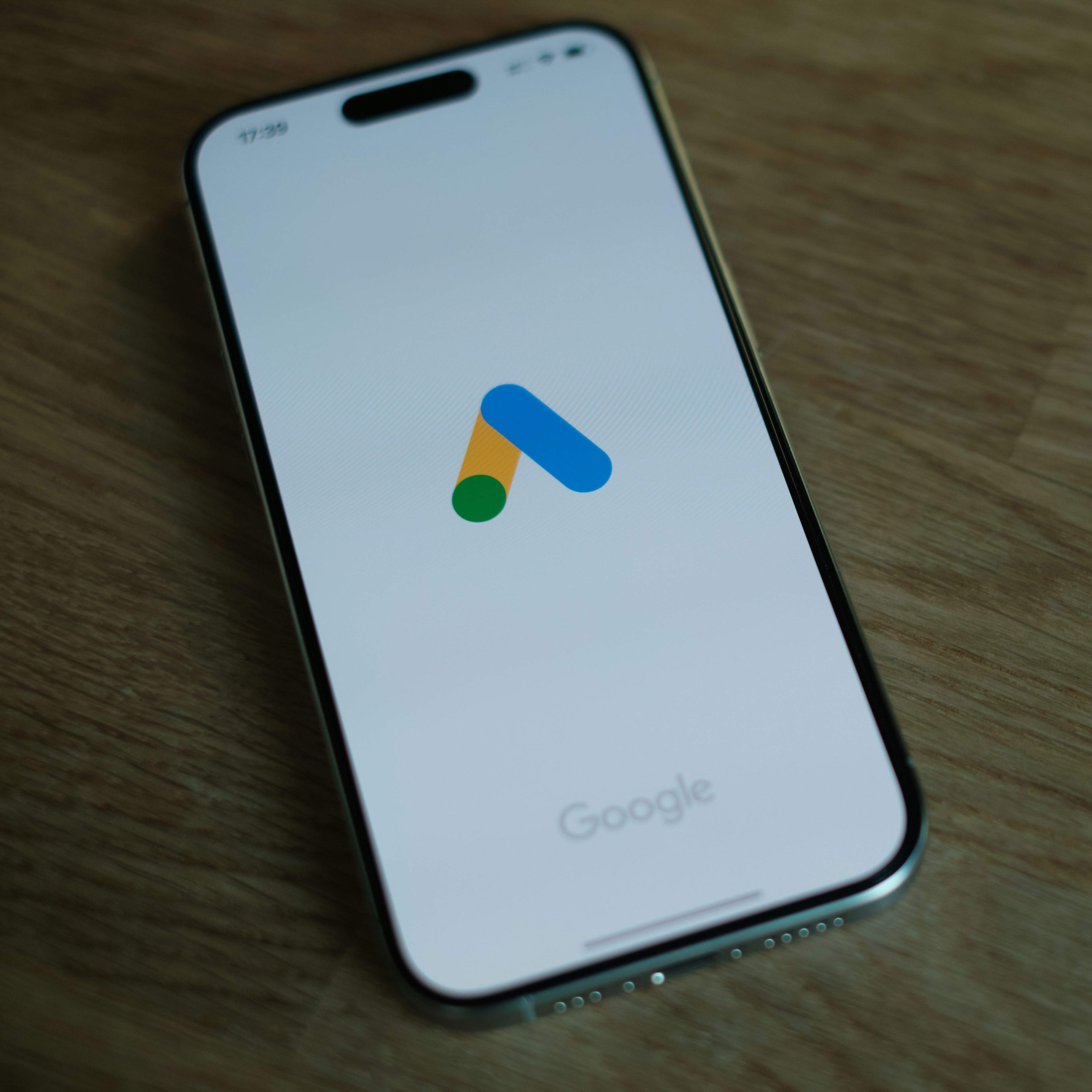 Phone with Google Ads logo on it.