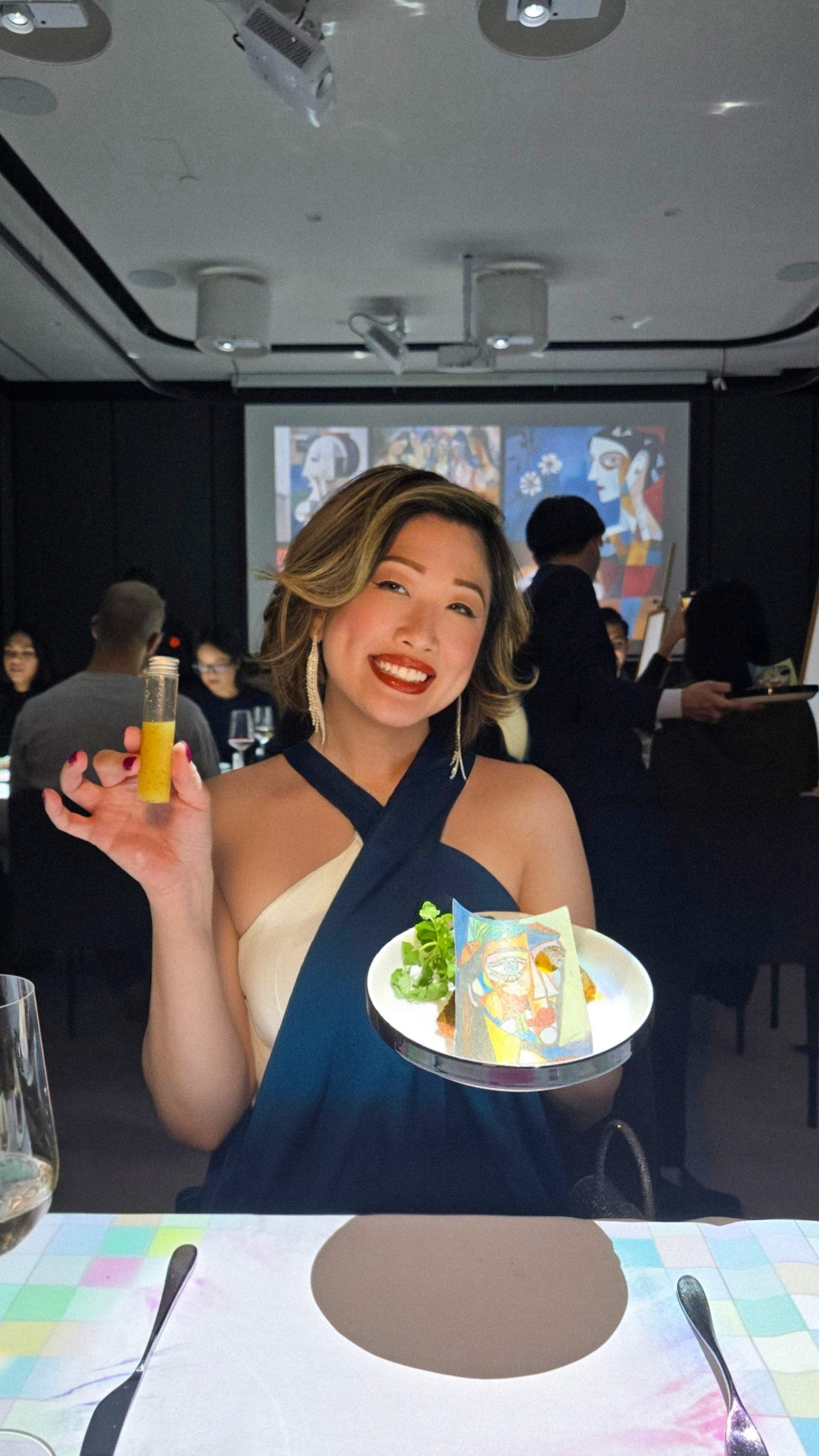 Guest enjoying the interactive Jackson Pollock "Savoury Painting" course at 7 Paintings Toronto, set at Canopy Hilton