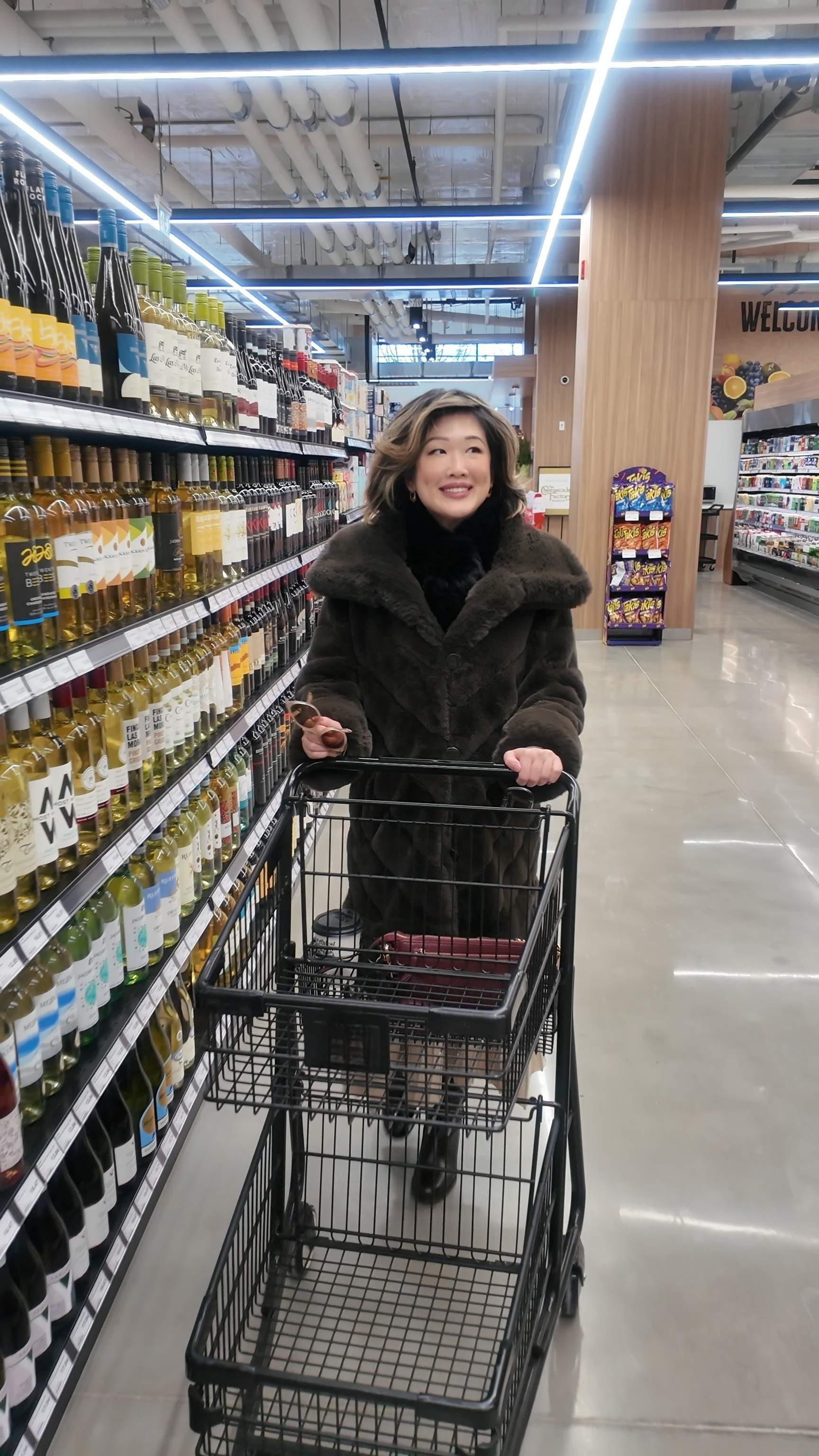 Shopping the gourmet aisles at Marché Leo’s new Waterfront grocery store for small-batch holiday essentials. 🛒