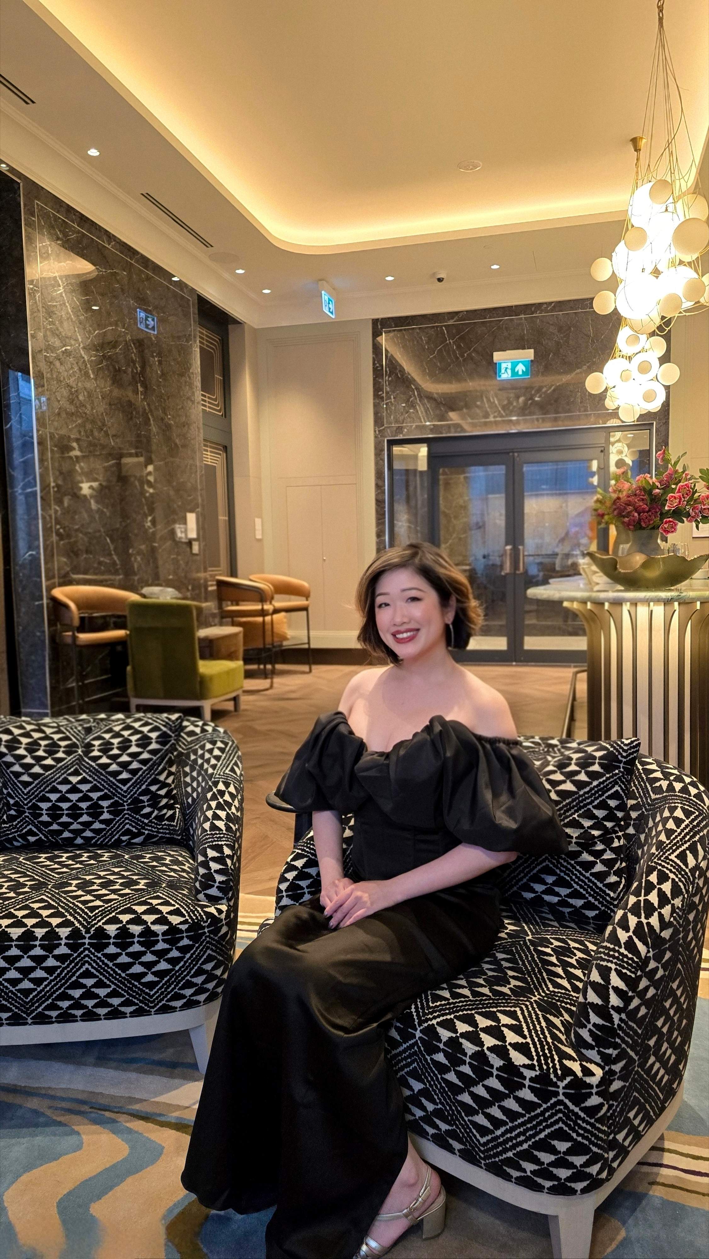 Relaxing in the grand marble lobby of Edenbridge by Tridel. A premium 9-storey luxury boutique condo in Toronto's Humber Valley.