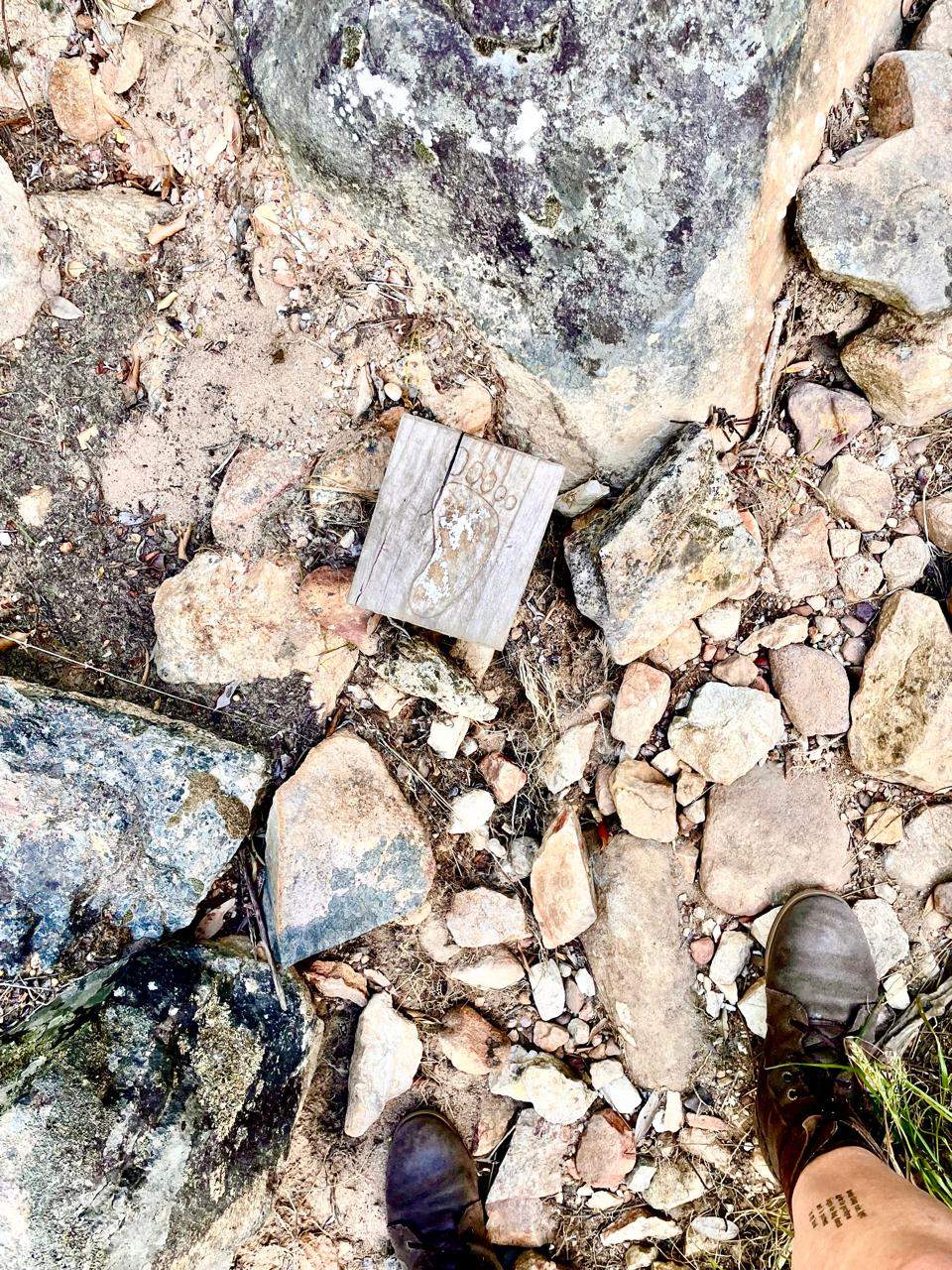 Rocky pathway with a trail marker set in the Citrusdal Valley