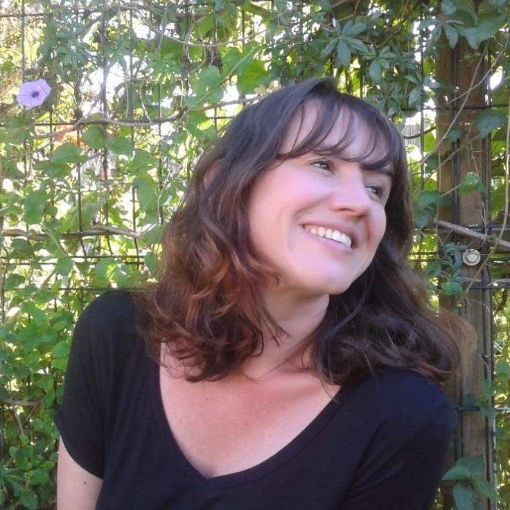 Anje Lombaard with a natural green environment as backdrop