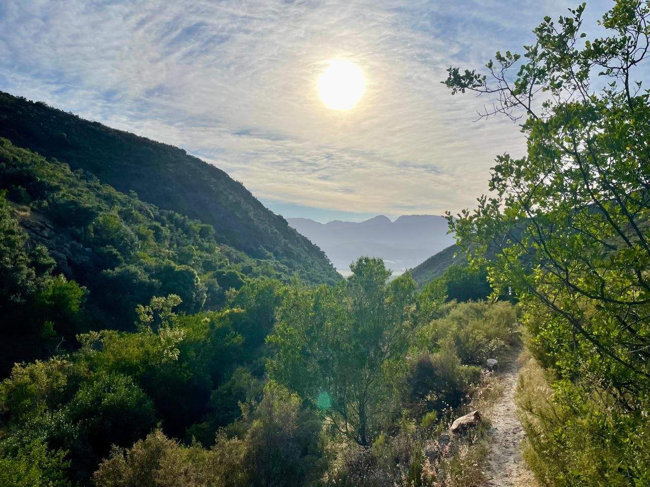 Early hike in Citrusdal with mountain ranges and a clear pathway visible.